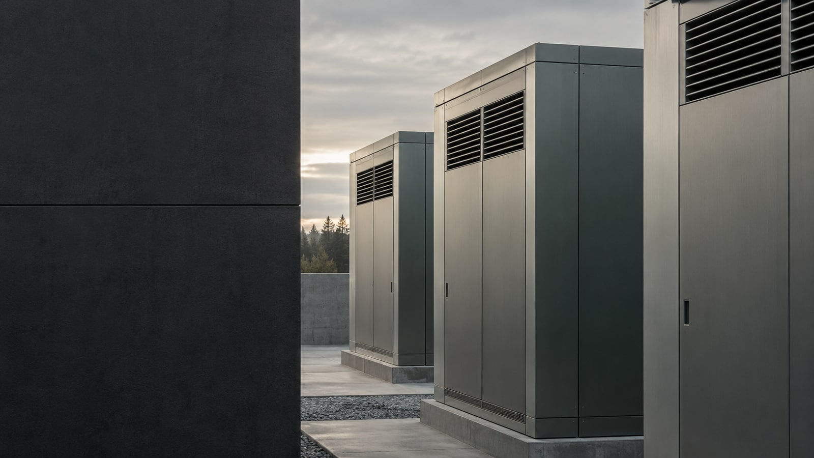 Graphite metal architecture with repeated seams and subtle ventilation details.